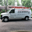 J E Shekell Inc's logo